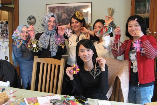 A 2015 Conversation and Crafts Group gathers to showcase their artwork.